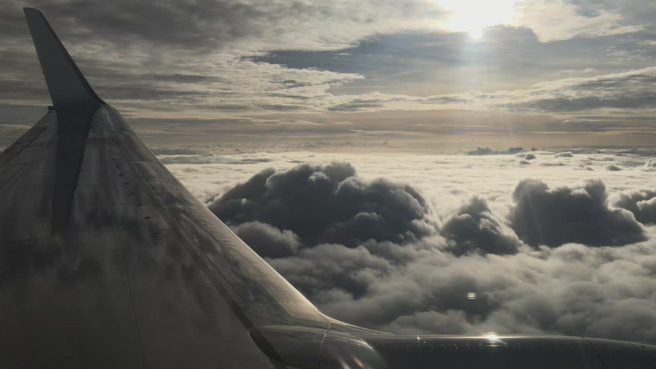 Aircraft wing above the clouds
