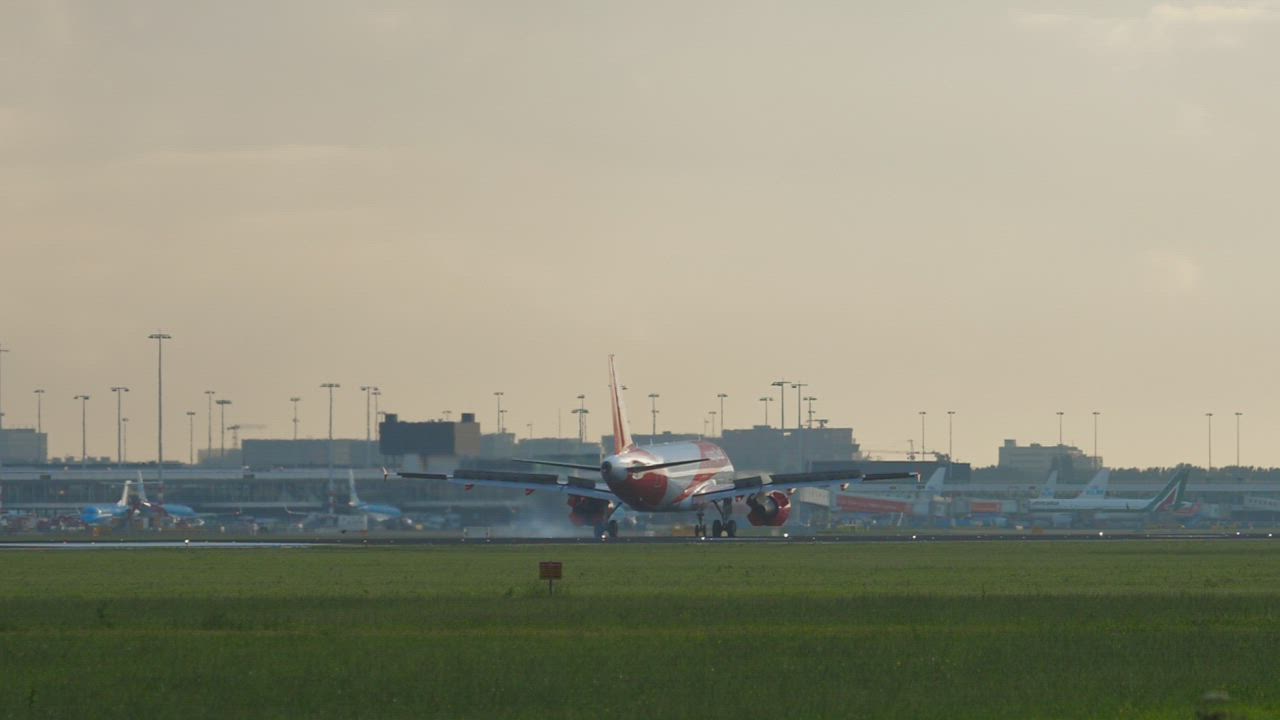 Airplane landing on a runway at an airport