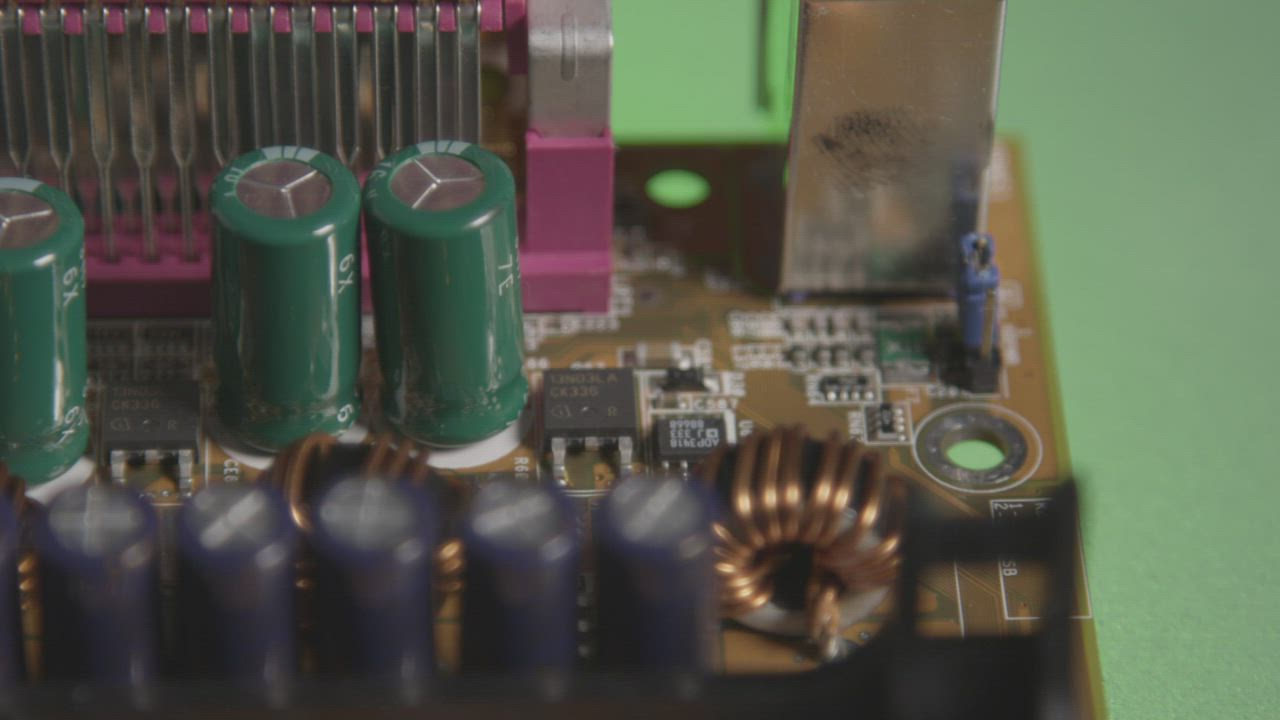 Close-up of a computer circuit board with processor and components